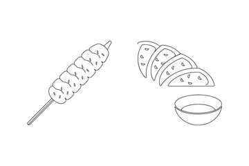 Skewered meatballs and sliced tacos with dipping sauce