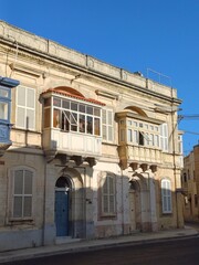 Naklejka premium Picturesque narrow street of medieval town in Rabat, Malta 