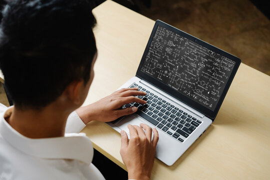 Mathematic equations and modish formula on computer screen showing concept of science and education