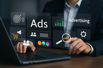 business man working on laptop with business graph