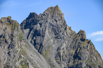 Rocky Mountain Peak Under Clear Blue Sky