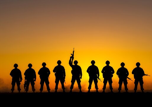 Nine Soldiers Silhouetted Against Vibrant Orange Sunset Holding Rifles yellow