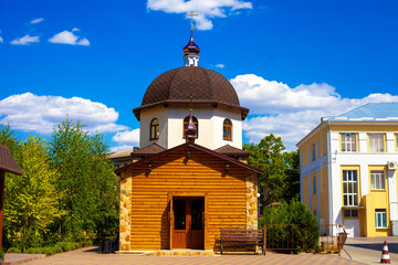 Church and house in the afternoon