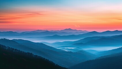 Obraz premium Majestic sunrise over misty mountain range, aerial view. Travel poster