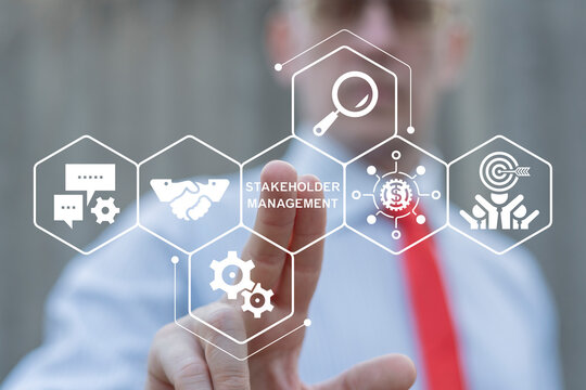 Business person using virtual touch screen push the inscription: STAKEHOLDER MANAGEMENT. Stakeholders Business Collaboration Financial Relationship concept.
