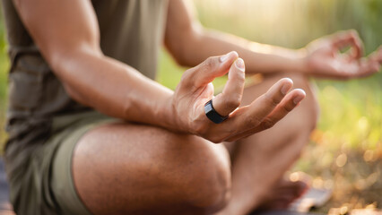 Smart ring meditation tracking, wearable wellness tech, biohacking mindfulness practice, outdoor zen moment, biometric relaxation sensor, quantified self tool