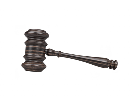 Wooden gavel rests on flat surface, symbolizing authority and justice. This classic tool is often associated with courtrooms and legal proceedings, evoking sense of order and decision making