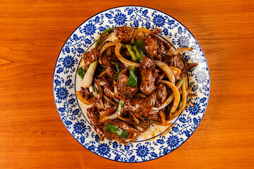 Szechuan beef with scallions and onions