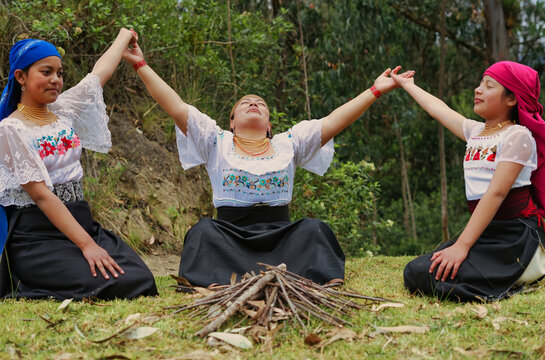 Indigenous women performing a ritual in nature - Powered by Adobe