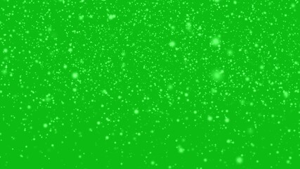 Snowflakes slowly falling down on a green background - Powered by Adobe
