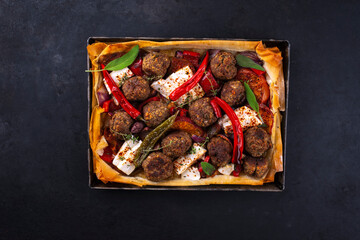 Artisan traditional Mediterranean minced lamb meatballs with chili peppers, feta sheep cheese and...