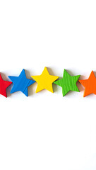 Fototapeta premium Colorful Wooden Stars on White Background Vibrant Education and Celebration Concept for Kids Projects