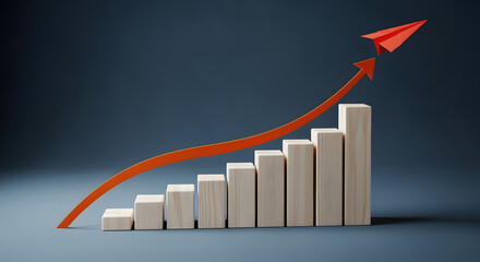 Wooden Bar Graph with Red Arrow and Paper Airplane Ascending on Dark Blue Background Visualizing Business Growth and Success