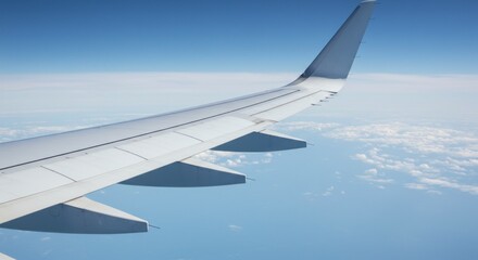 Airplane wing over clouds (1)