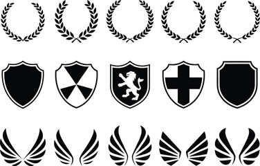 A collection of black and white heraldic design elements arranged in rows. Includes laurel wreaths, crest shields, and stylized wings for logos and emblems.