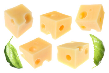 Cheese cubes and green basil leaves isolated on white, set