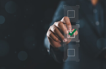 Businessman showing check and check mark, concept of rules of conduct, rules and policies, company articles of association, Terms and Conditions, putting checkmark on a business test
