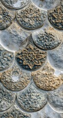 Decorative stone tiles in fish scale pattern