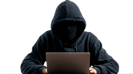 Mysterious hacker typing rapidly on laptop in the shadows