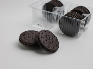 Black biscuits isolated on white background