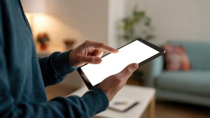 Stay connected with a touch using a tablet with a blank white screen in the comfort of your home