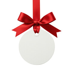 A blank white circular tag elegantly tied with a vibrant red satin ribbon bow isolated on transparent background
