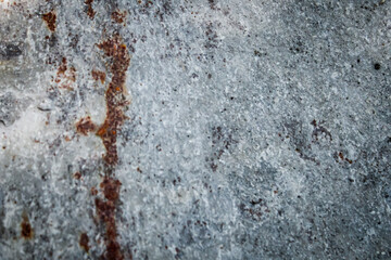 weathered textured surface with distressed metal or concrete look. rusty details with antique aesthetic. abstract background with copy space.