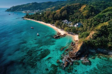 Obraz premium Aerial view of tropical beach with turquoise water and lush hillside