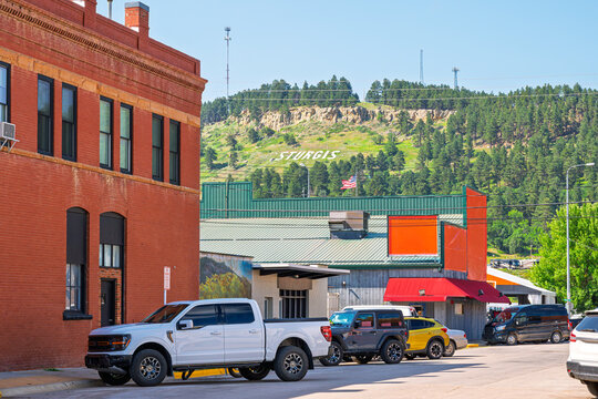 The iconic Sturgis letters sign on a hillside above the small town of Sturgis, South Dakota, home of the annual Sturgis Motorcycle Rally.