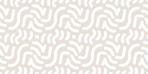 Abstract white brush strokes on a beige background seamless pattern