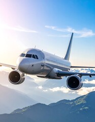 Naklejka premium Airplane in flight above mountain range, sunrise