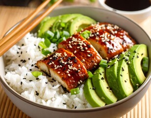 Bowl of rice, grilled eel, and avocado