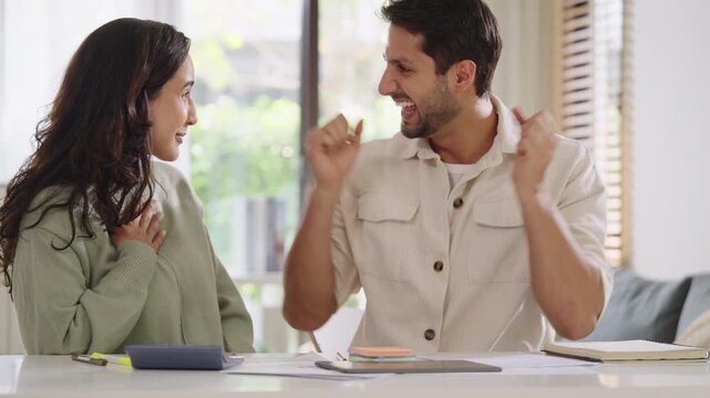 Couple using tablet and credit card to shop online through e-commerce app, making payment and browsing modern platform with promo codes and discount offers
