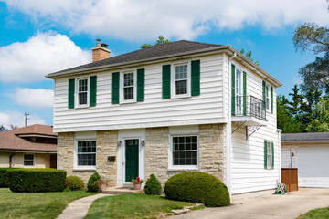 Residential property house. Residence architecture. Suburban neighborhood. Suburban house architecture. Private house. Neighborhood architecture. Property in neighborhood. Quiet neighborhood