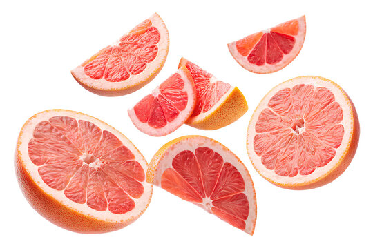 Juicy pink grapefruit slices and halves isolated on black background, ideal for healthy eating, juice, or citrus fruit themes.