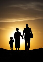 Fototapeta premium Silhouetted Family Walking Hand in Hand at Sunset on Beach