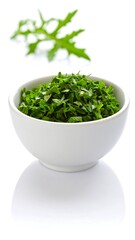 Chopped parsley in a white bowl