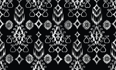 Seamless geometric ethnic pattern in black and white. Abstract hand drawn retro texture.
