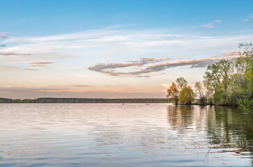 Blue lake with cloudy sky, natural background