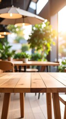 Obraz premium Light wooden table in a sunlit cafe