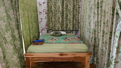 Cozy massage bed setup in spa room