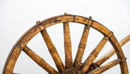 Close Up of Rustic Wooden Wagon Wheel Highlighting Craftsmanship and Historical Design