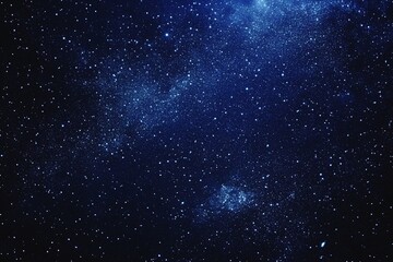Fototapeta premium Starry sky background, blue night sky full of stars, glowing stars in the dark space, starry background, dark night, stars in the distance, starlight, dark background with a blue glow, night sky. 