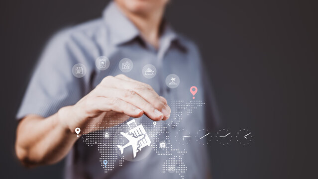 Businessman interacting with digital world map and travel icons for global smart booking and virtual tourism planning interface - Powered by Adobe