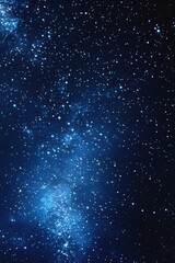 Obraz premium Starry sky background, blue night sky full of stars, glowing stars in the dark space, starry background, dark night, stars in the distance, starlight, dark background with a blue glow, night sky. 