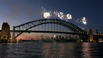 Famous arch bridge with fireworks display over calm water at night - Powered by Adobe