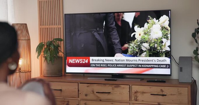 Person, watching TV and screen for news update with back for head state funeral, casket and headlines at home. Television, broadcast and monitor for program, report and memorial show for president