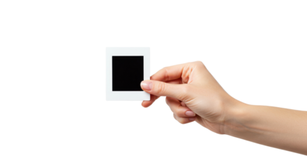 Female hand holding vintage slide frame isolated PNG with Transparent Background