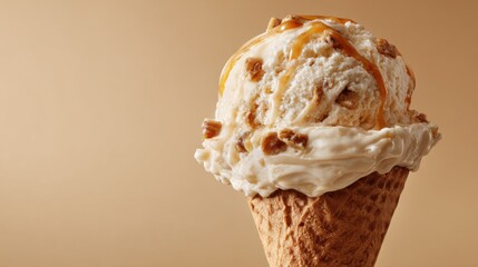 A delicious scoop of caramel ice cream rests in a waffle cone, highlighting its creamy texture and rich flavor. The warm brown background enhances the treat's appeal.