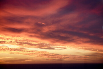 the sky is glowing red and orange